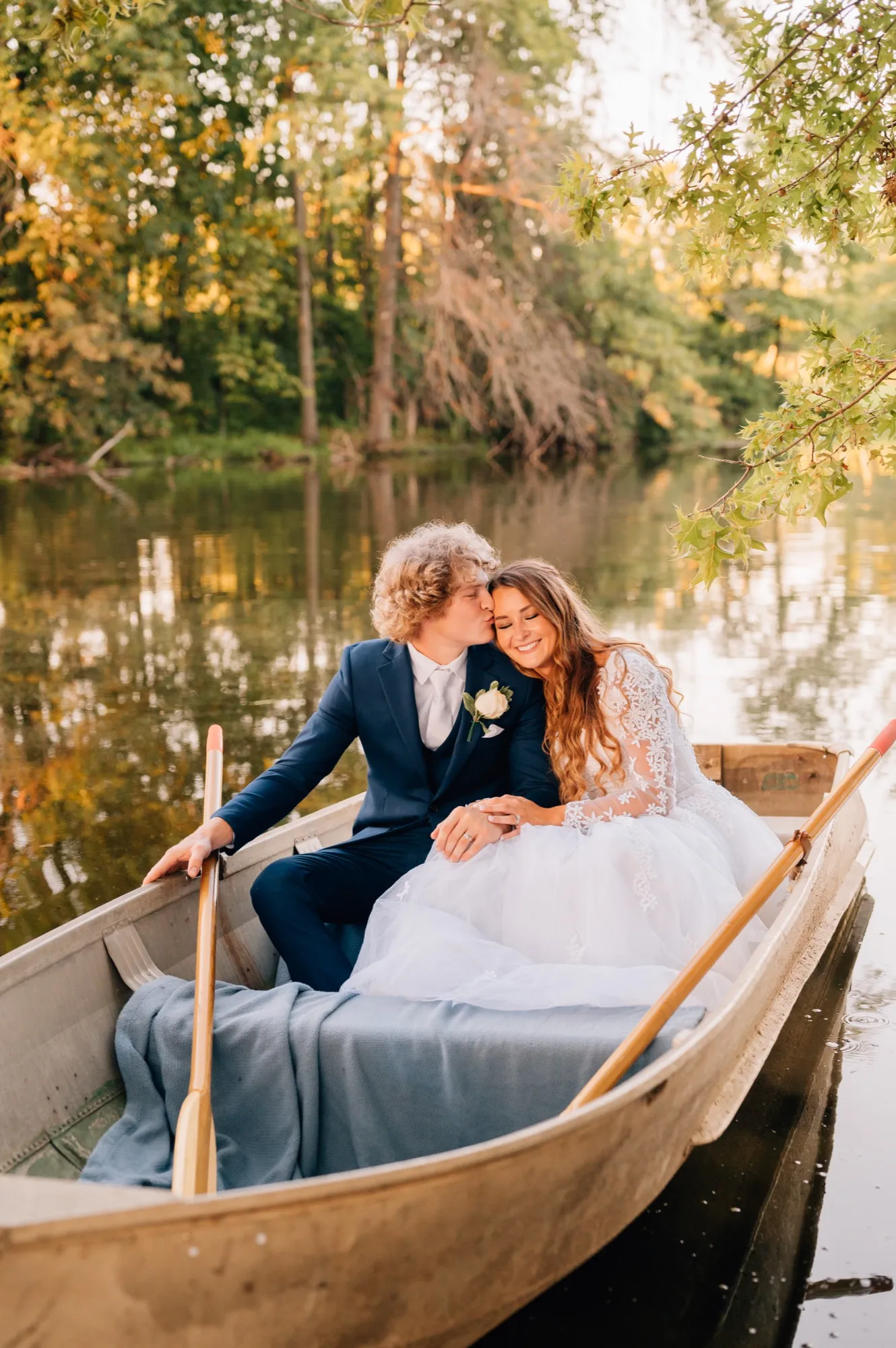 Golden-hour rowboat portraits at Abram Farms