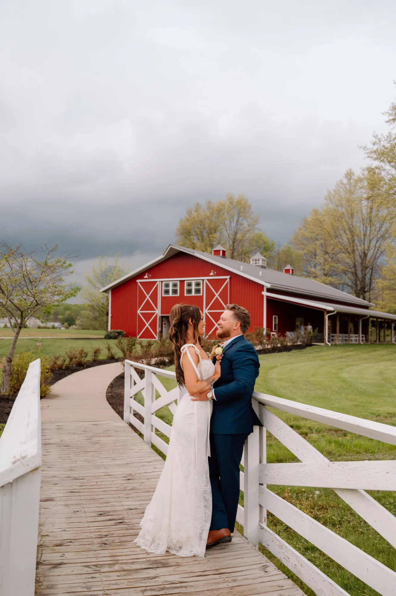 Couple on the footbridge at Abram Farms