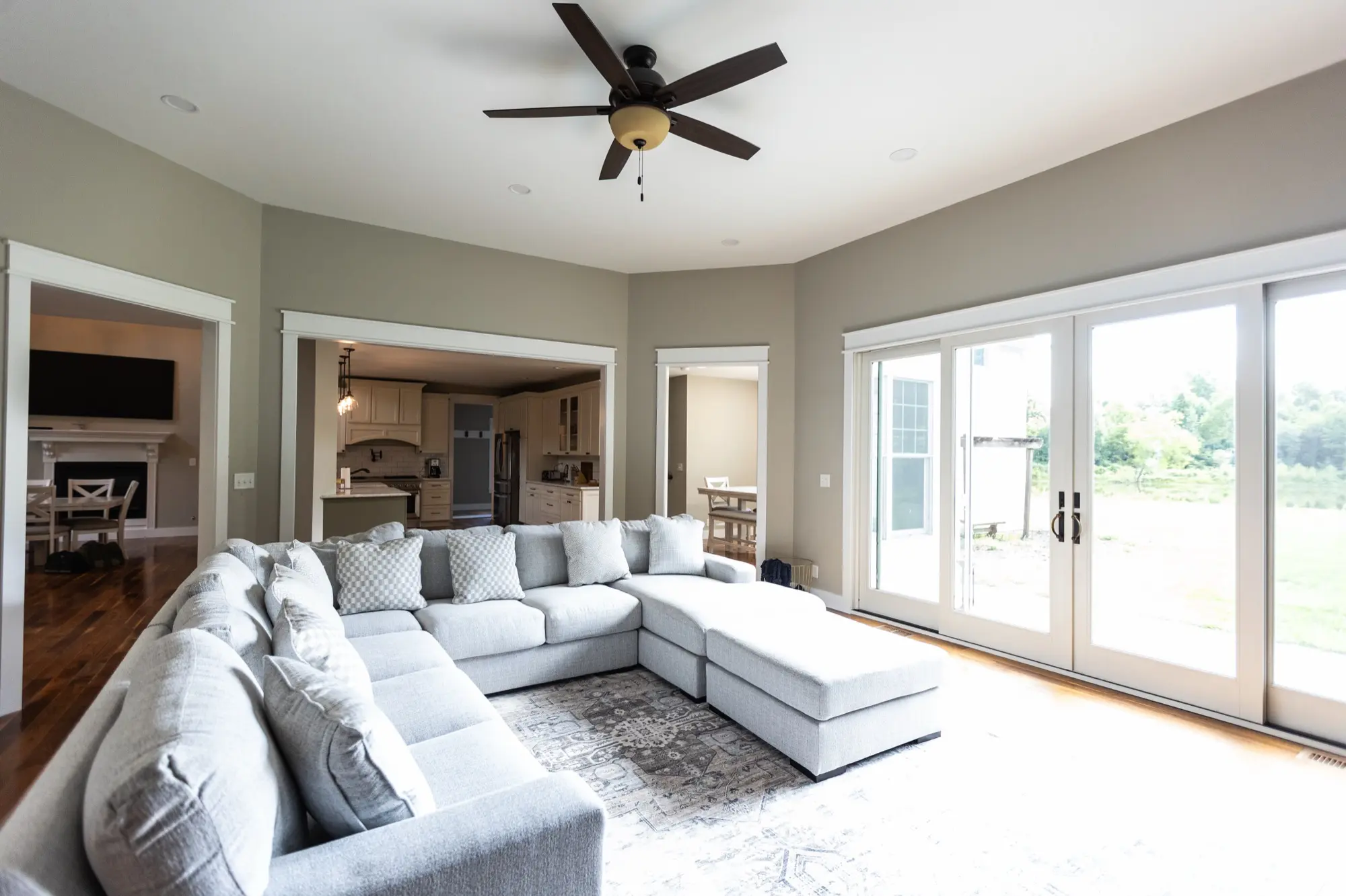 Living room at Lakeside Manor with sliding doors to the patio